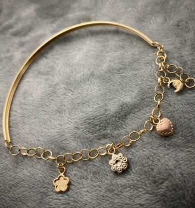 Pulso de PD con dijes  en Tres Oros 18K 3.7gr 20cm