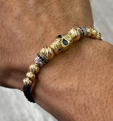 Pulsera En Hilo Negro Con Herraje De Calavera Oro Amarillo Y Blanco 18k